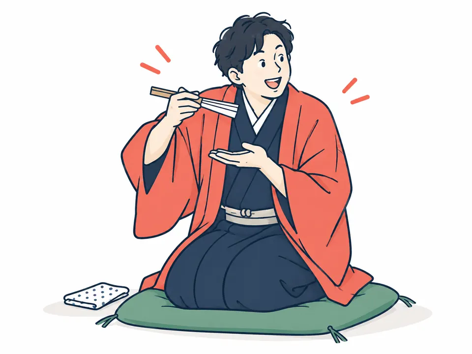 座布団に座り、扇子を箸に見立てて食べるしぐさをする着物姿の男性